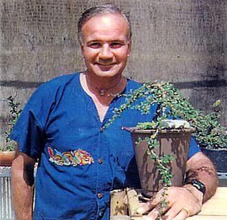 J. Martin Lasica with a bonsai tree.